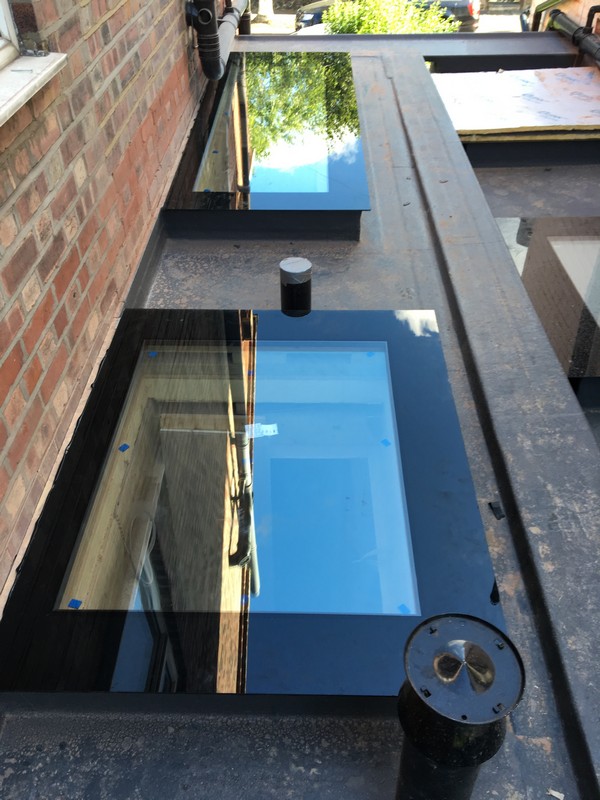 Multiple flat roof skylights on extension in Stratford